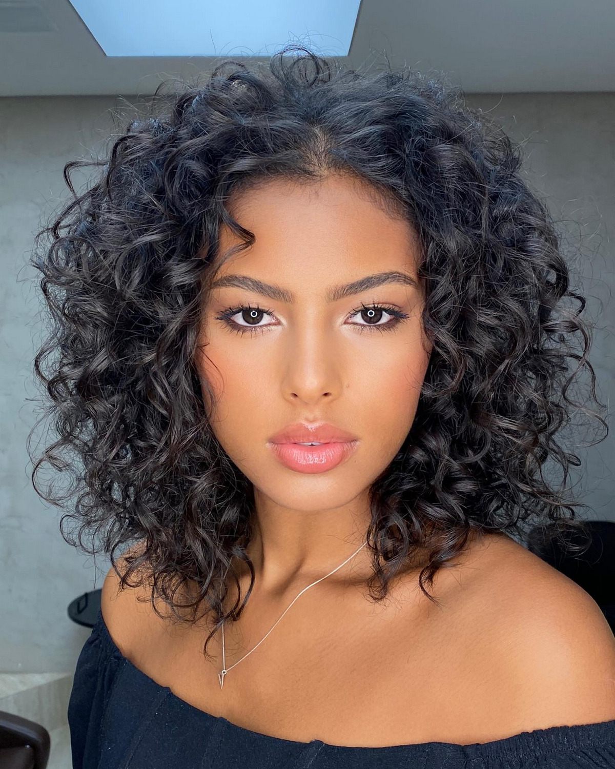 Midnight Brown Curls With A Middle Part