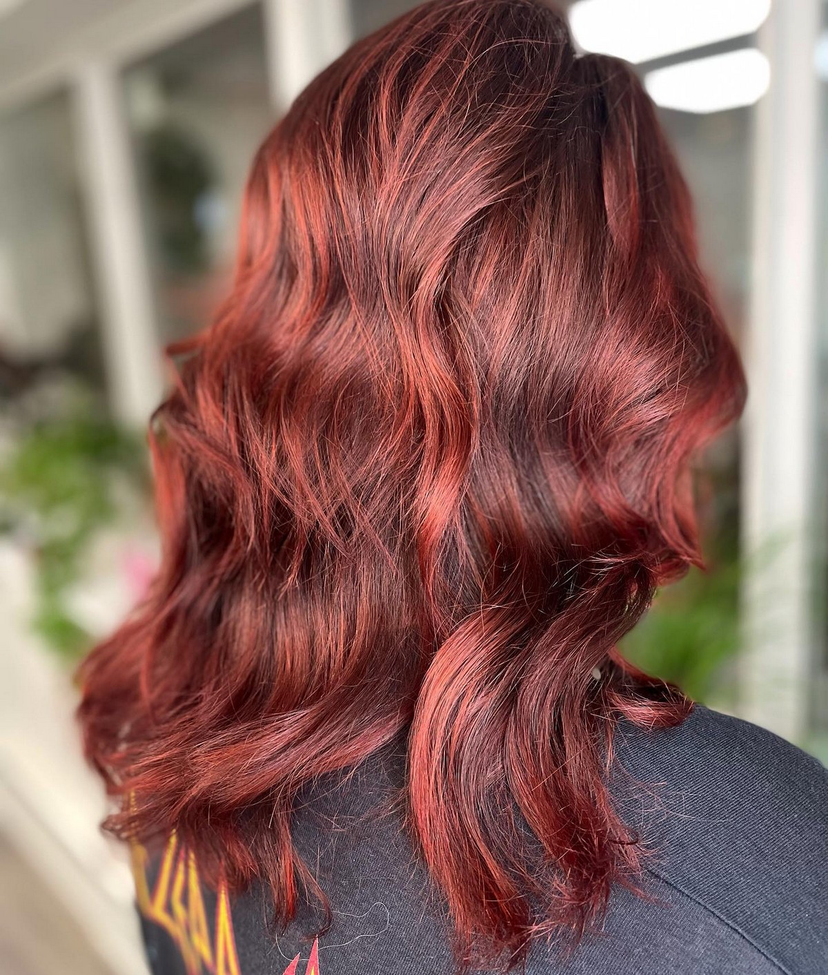 Red Layer Of Blunt, Wavy Hair