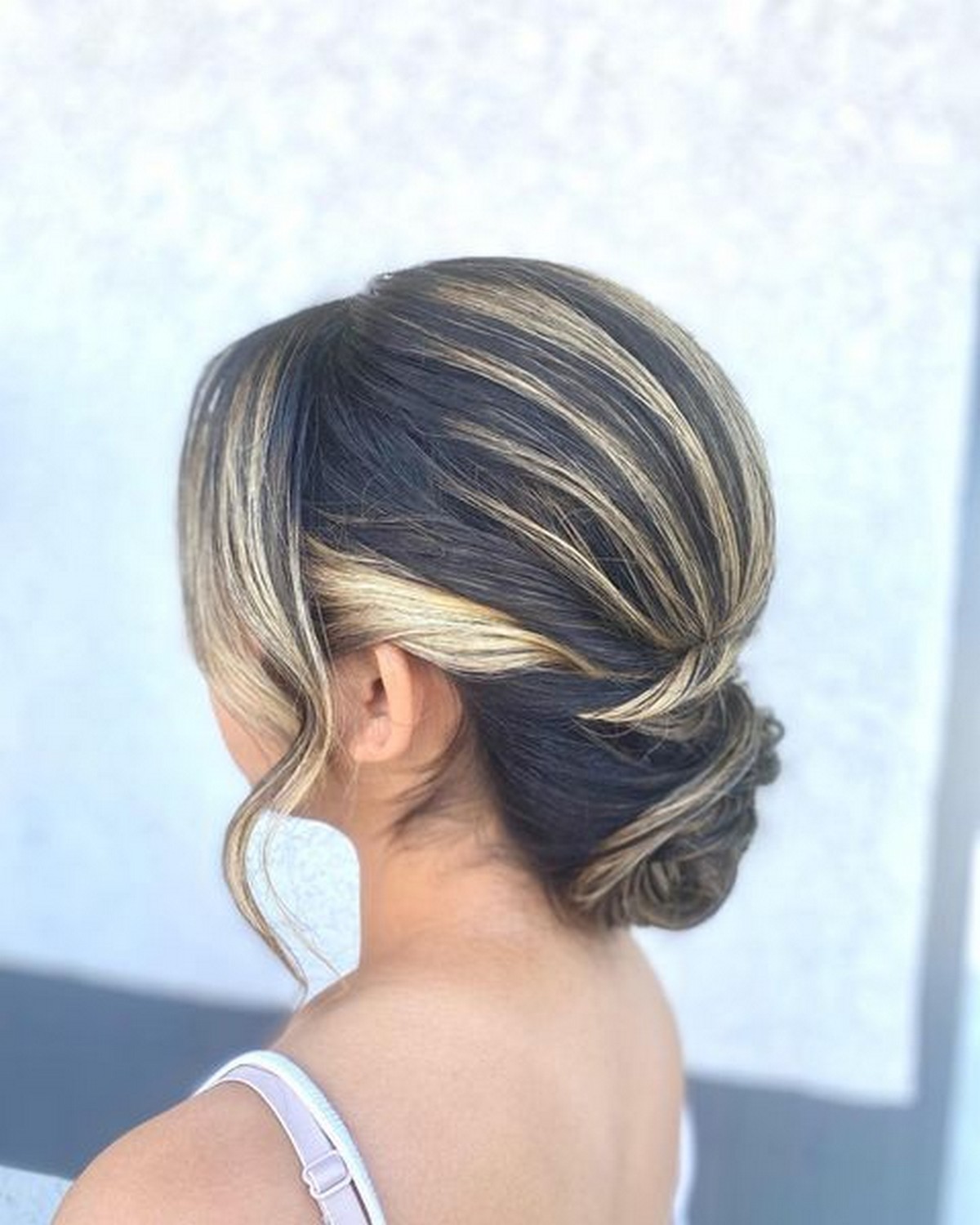 Highlight Low Updo With Feather Bangs