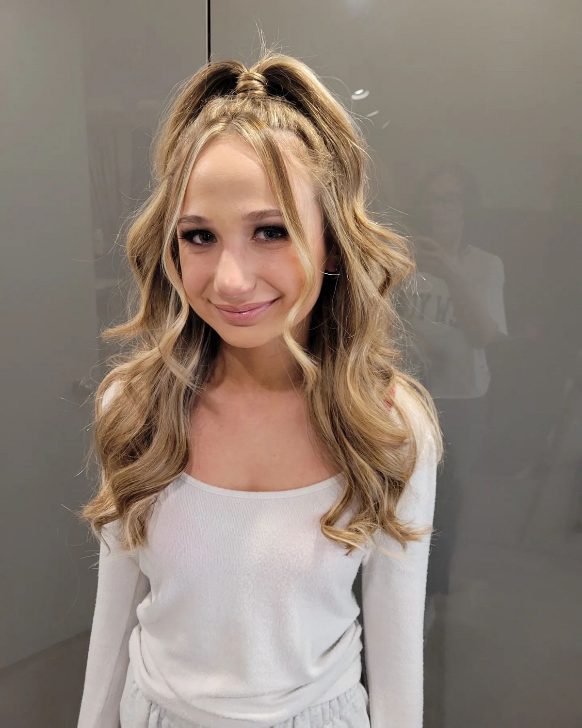 Blonde Wavy Thick Hair With A Half-Up Ponytail
