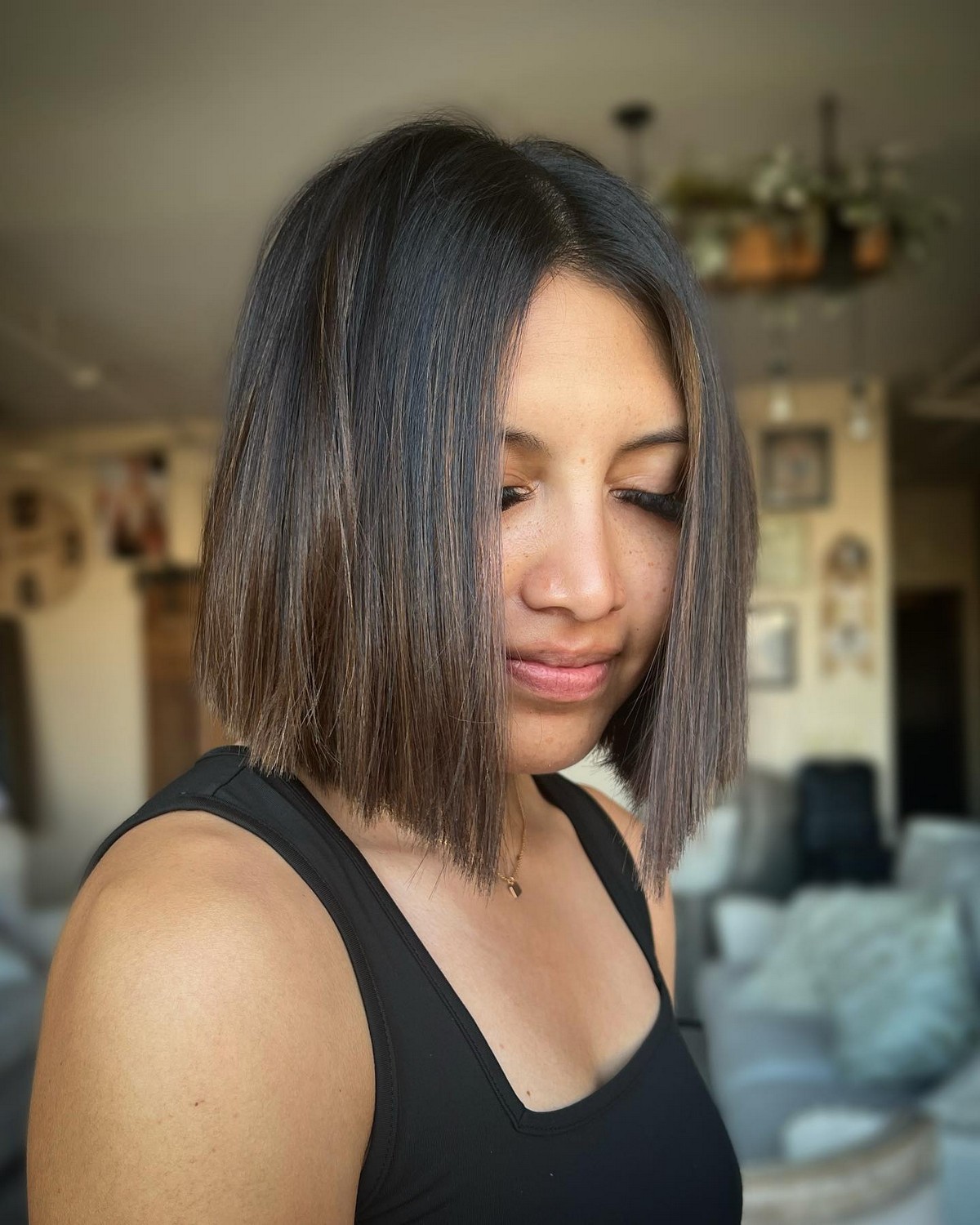 Chocolatey Blunt Balayage With The Middle Part