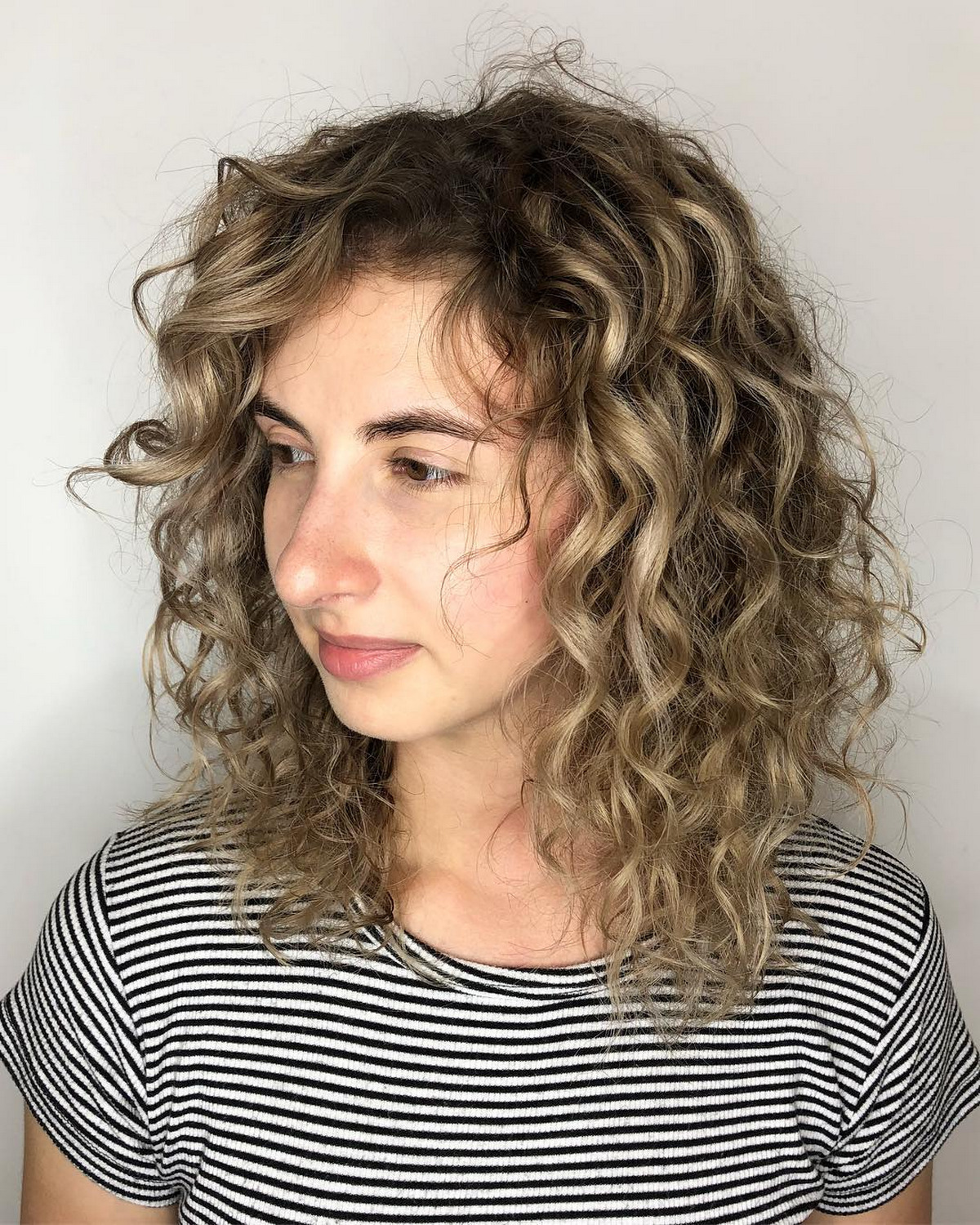Medium Layered Blonde Curls