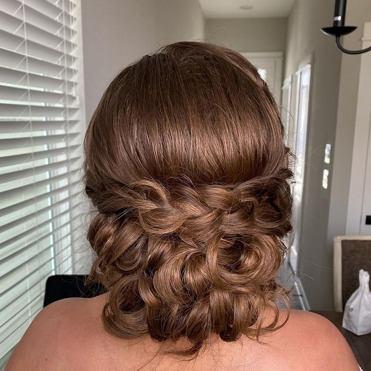 Brown Braid Low Soft Updo