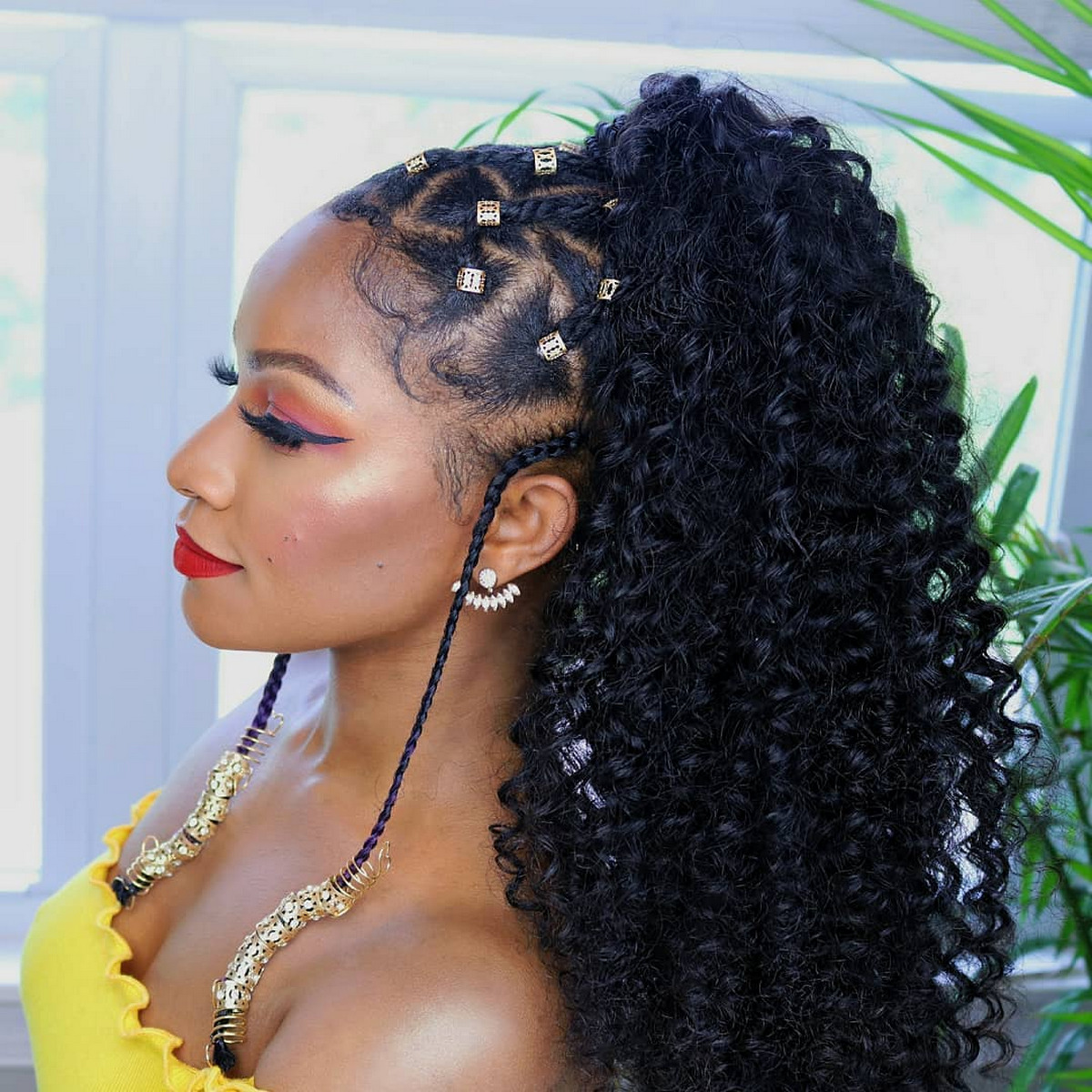 Curly Ponytail with Braids and Cuffs