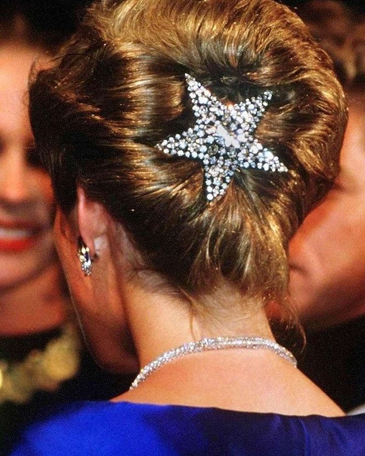 French Class Updo With A Diamond Star-Shaped