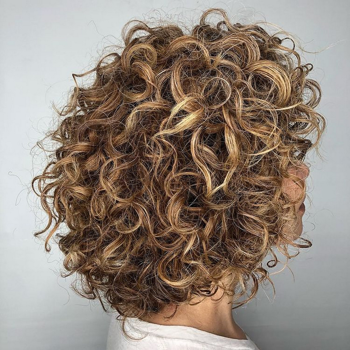 Curly Rounded Caramel Brown Bob