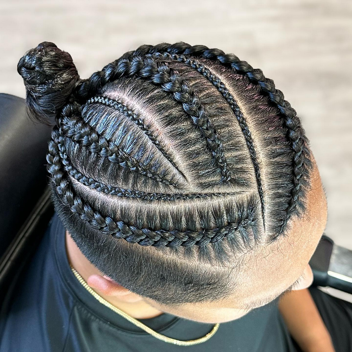 Cornrows With Fade and Top Knot