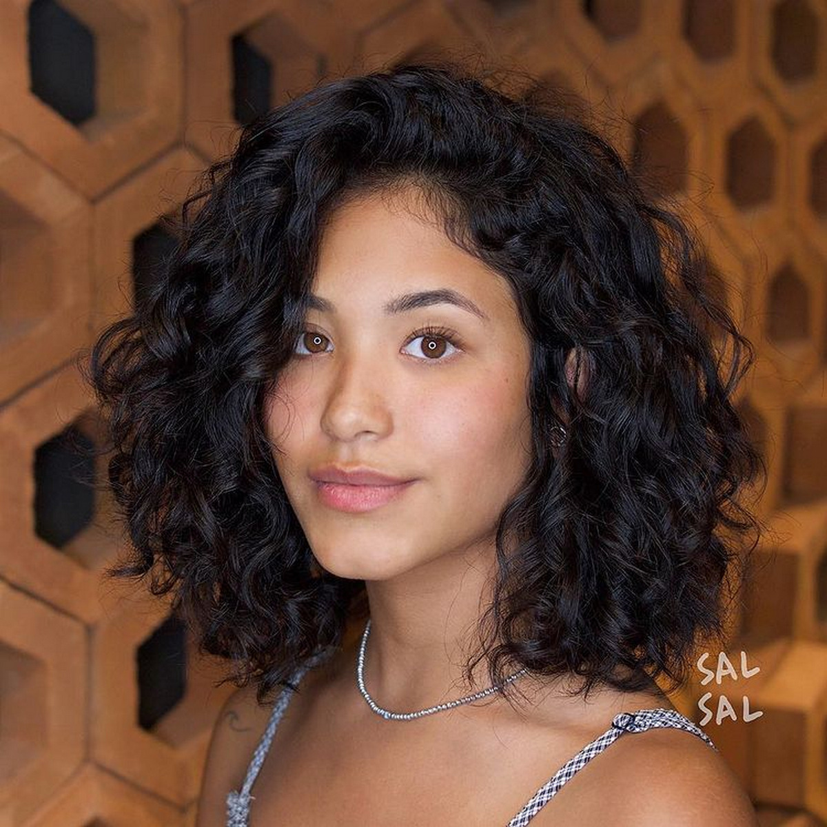 Voluminous Curly Brunette Lob