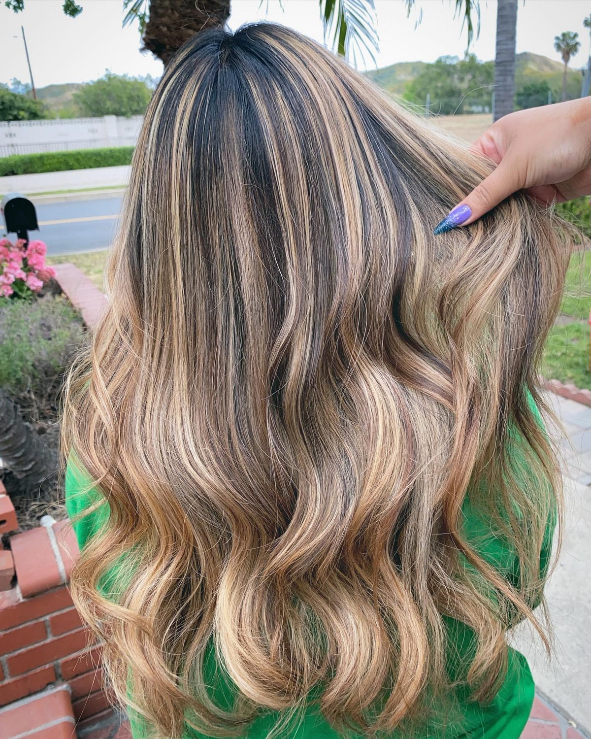 Honey Caramel Blonde Highlights With A Balayage Effect On Black Hair