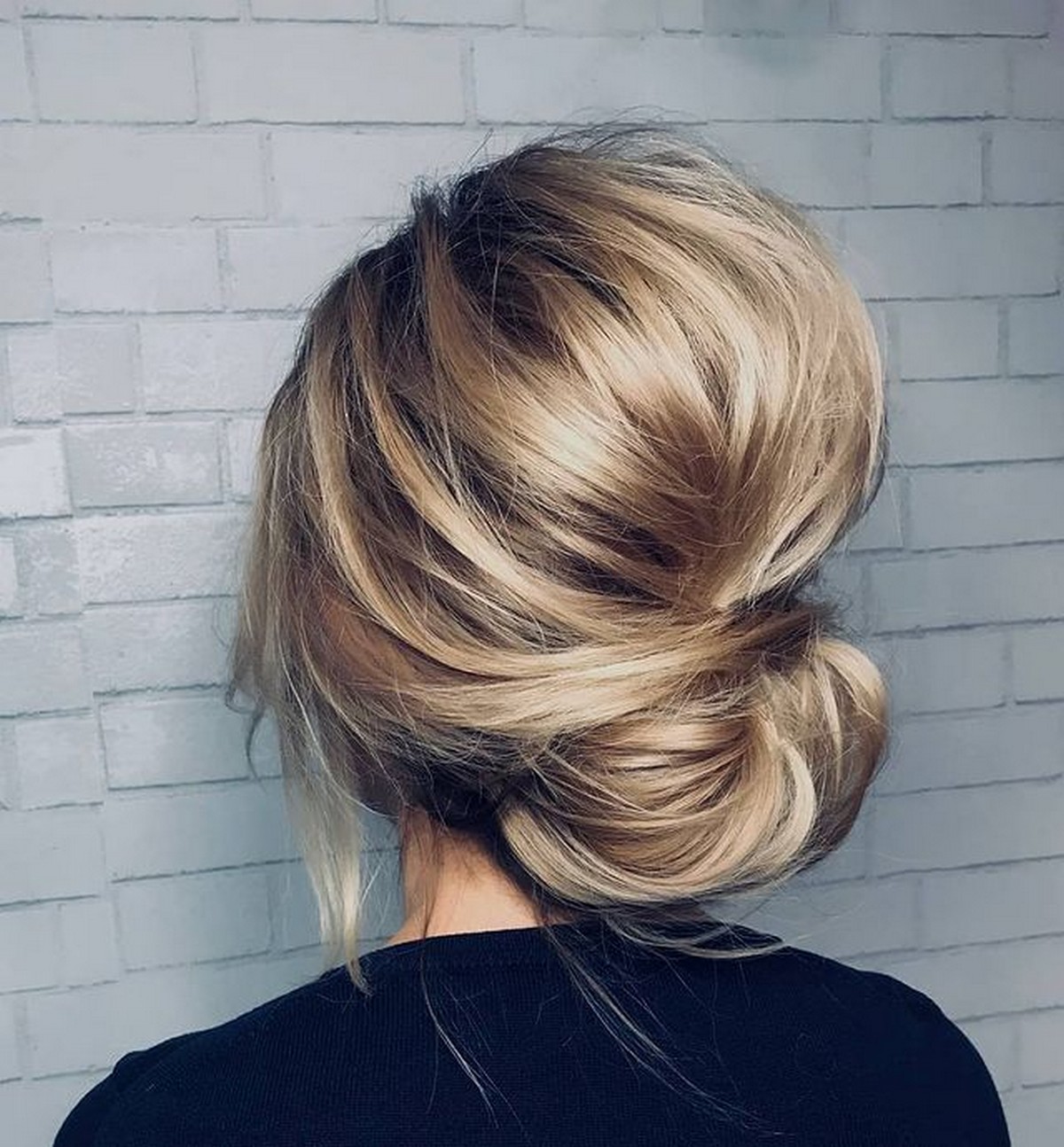 Shinny Tuck Updo With A Big Bouffant