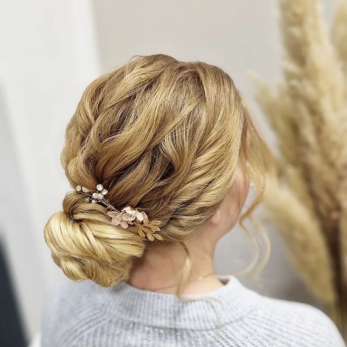 Blonde Wavy With Low Twist Updo