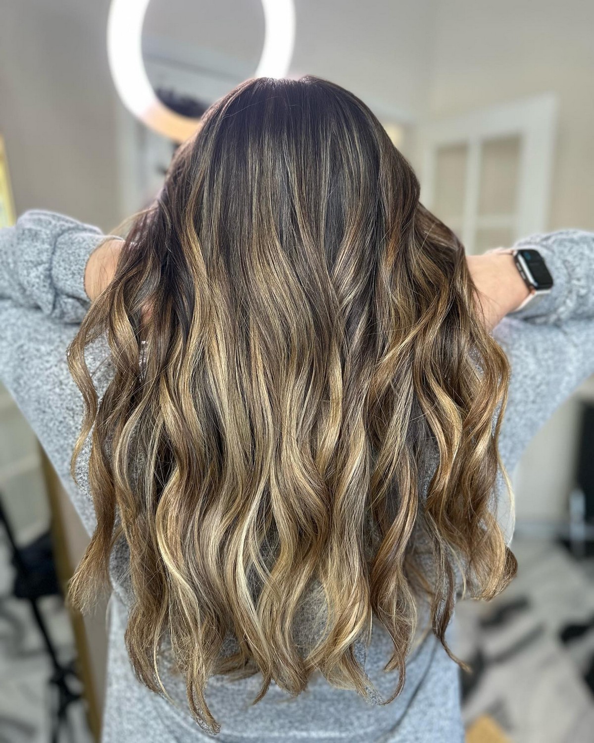 Sandy Blonde Highlights With A Balayage Effect On Black Hair