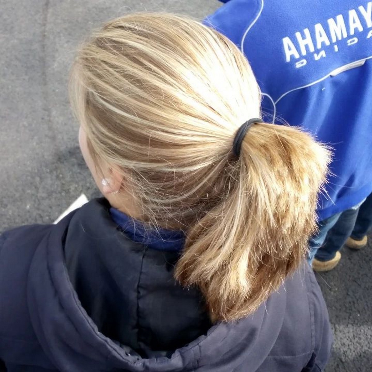 Light Blonde Thick Ponytail With Blunt Cut Ends