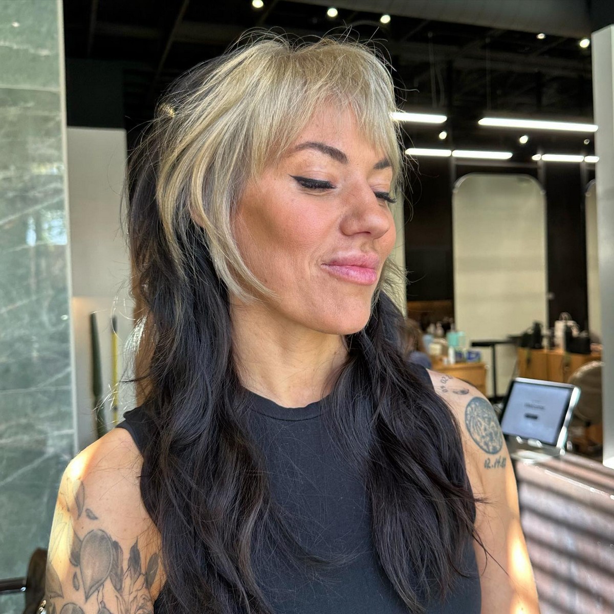 Black Shag Haircut With Bleach Bangs