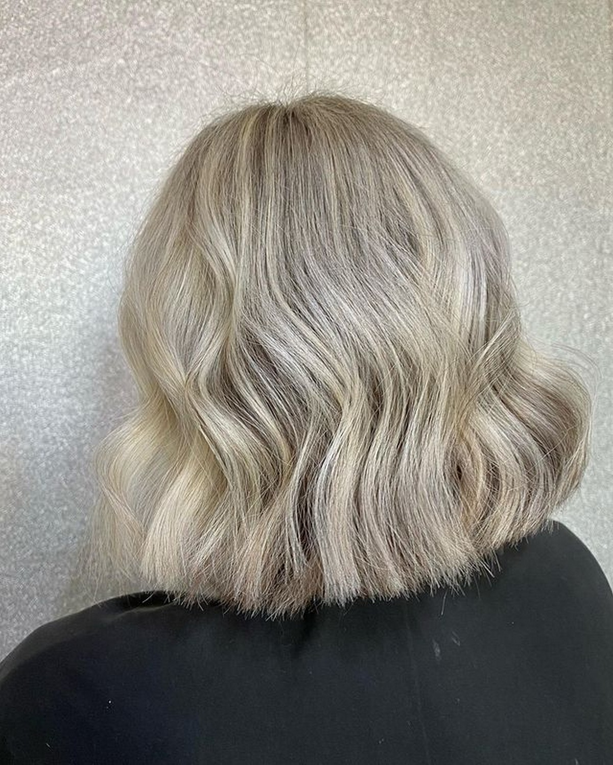Tousled Beachy Waves With Blonde Highlights