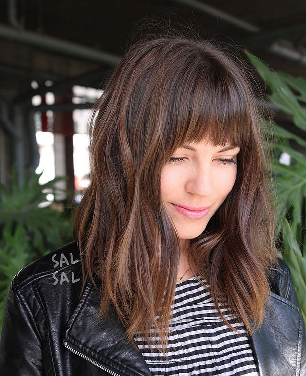 Medium-Length Brown Hair With Bangs And Caramel Highlights