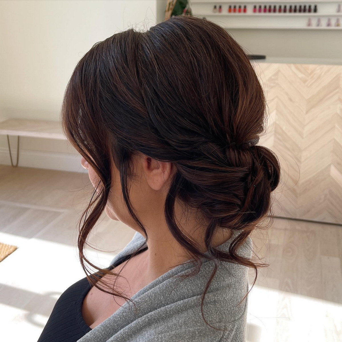 Low Bun With Side Part