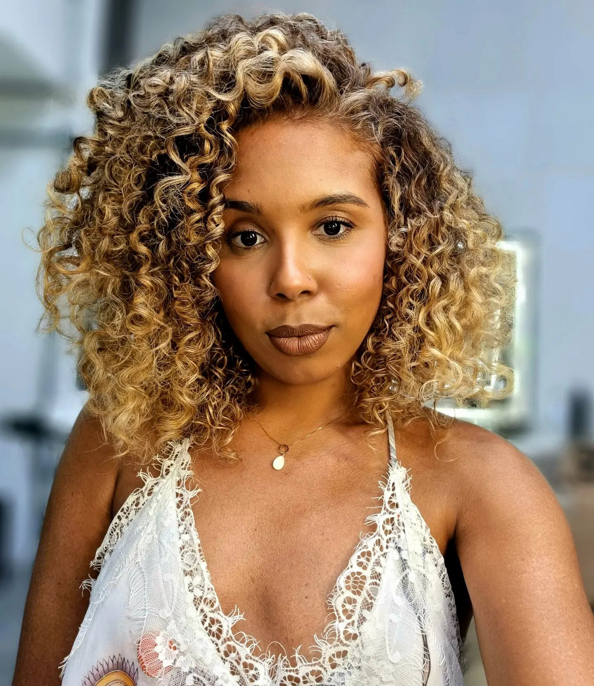 Side Swept Curly Hairstyle