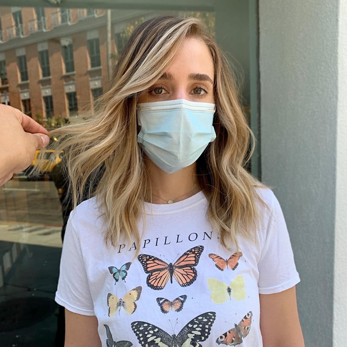 Side Swept Bangs with Blonde Highlights