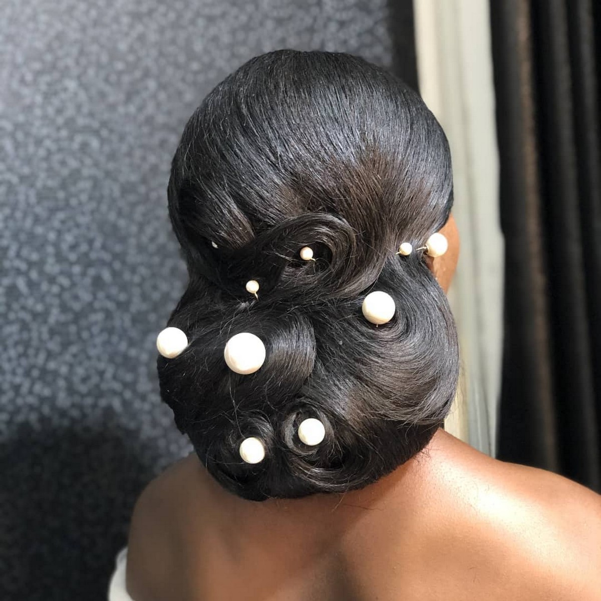 Big Low Bridal Updo with Jumbo Pearls