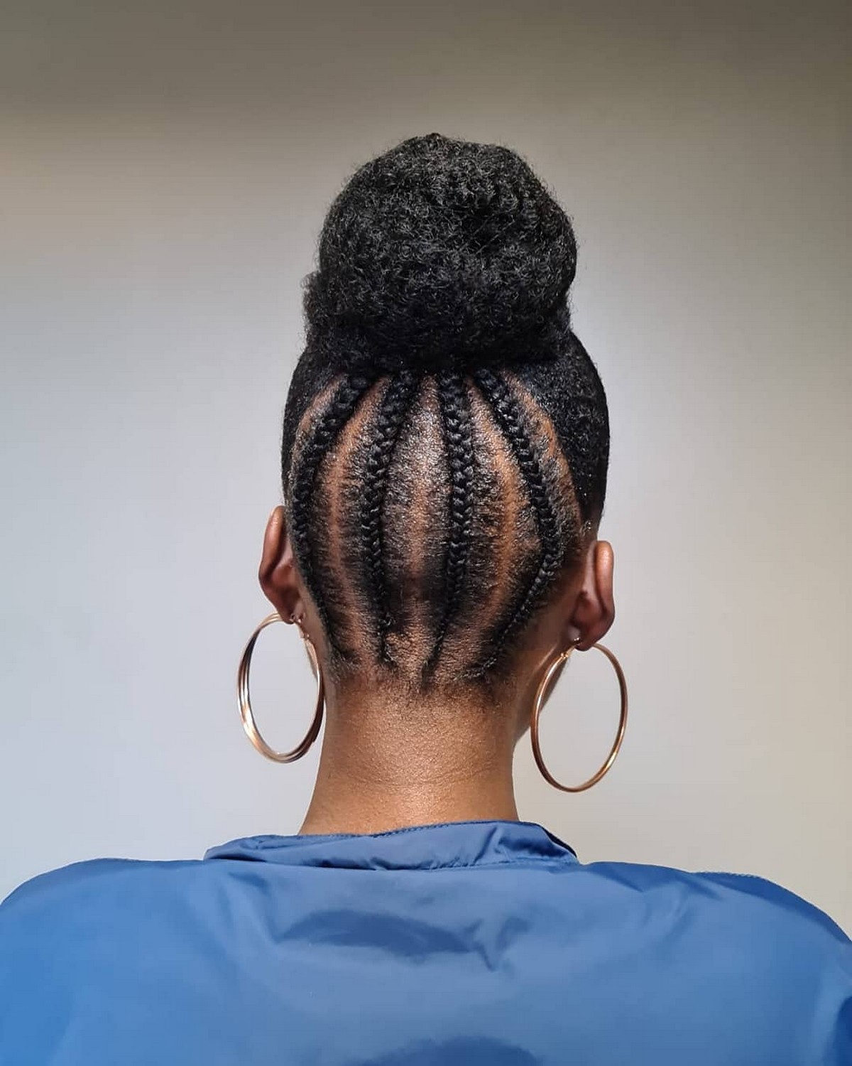 High Bun with Back Vertical Cornrows