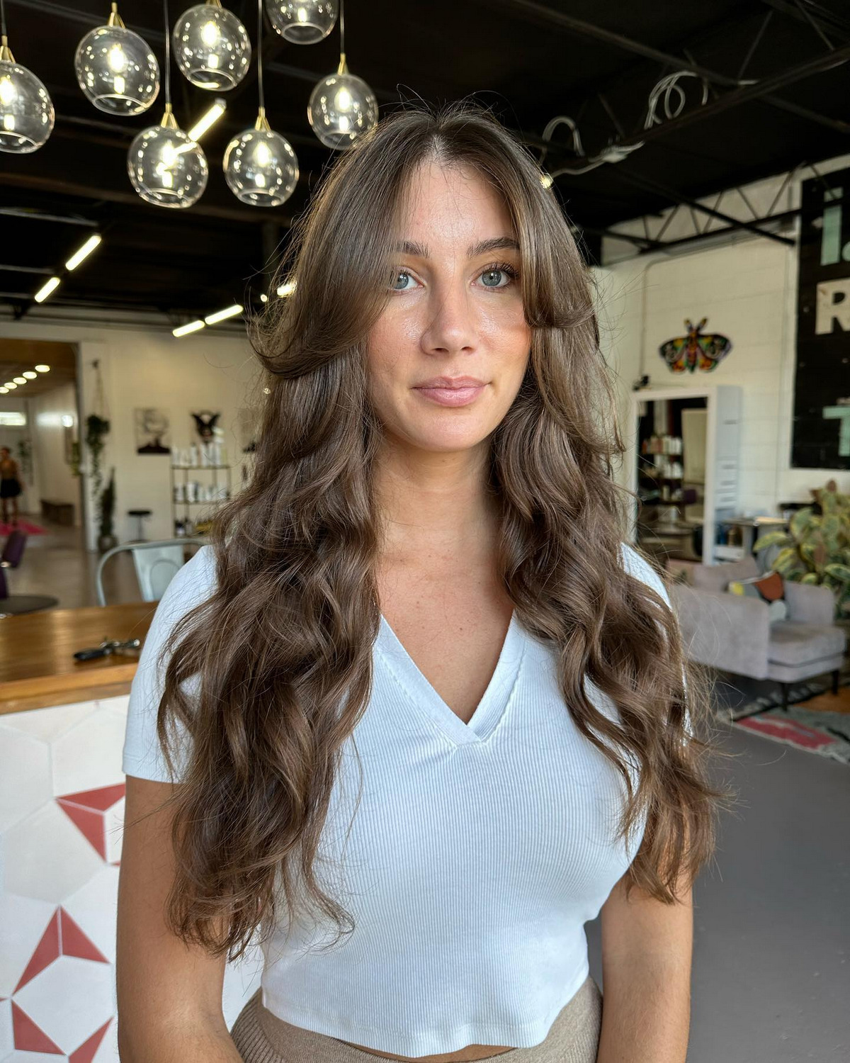 Layered Haircut With Long Curtain Bangs