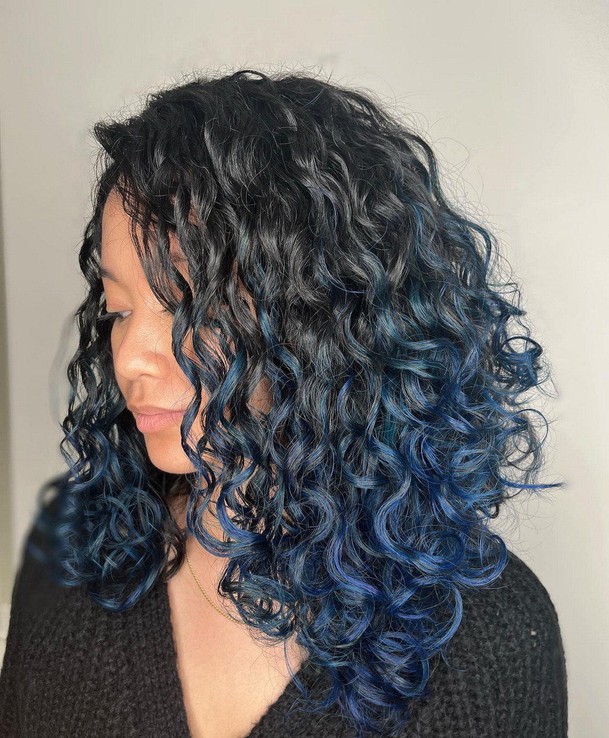 Curly Asymmetrical Bob With Blue Ombre