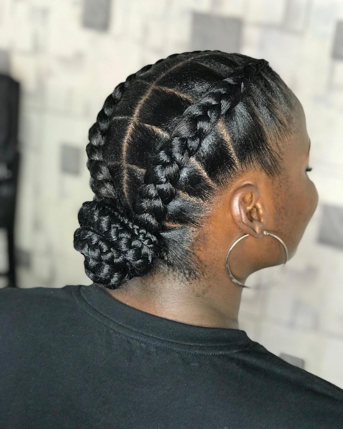 Shiny Bun Updo with Two Braids