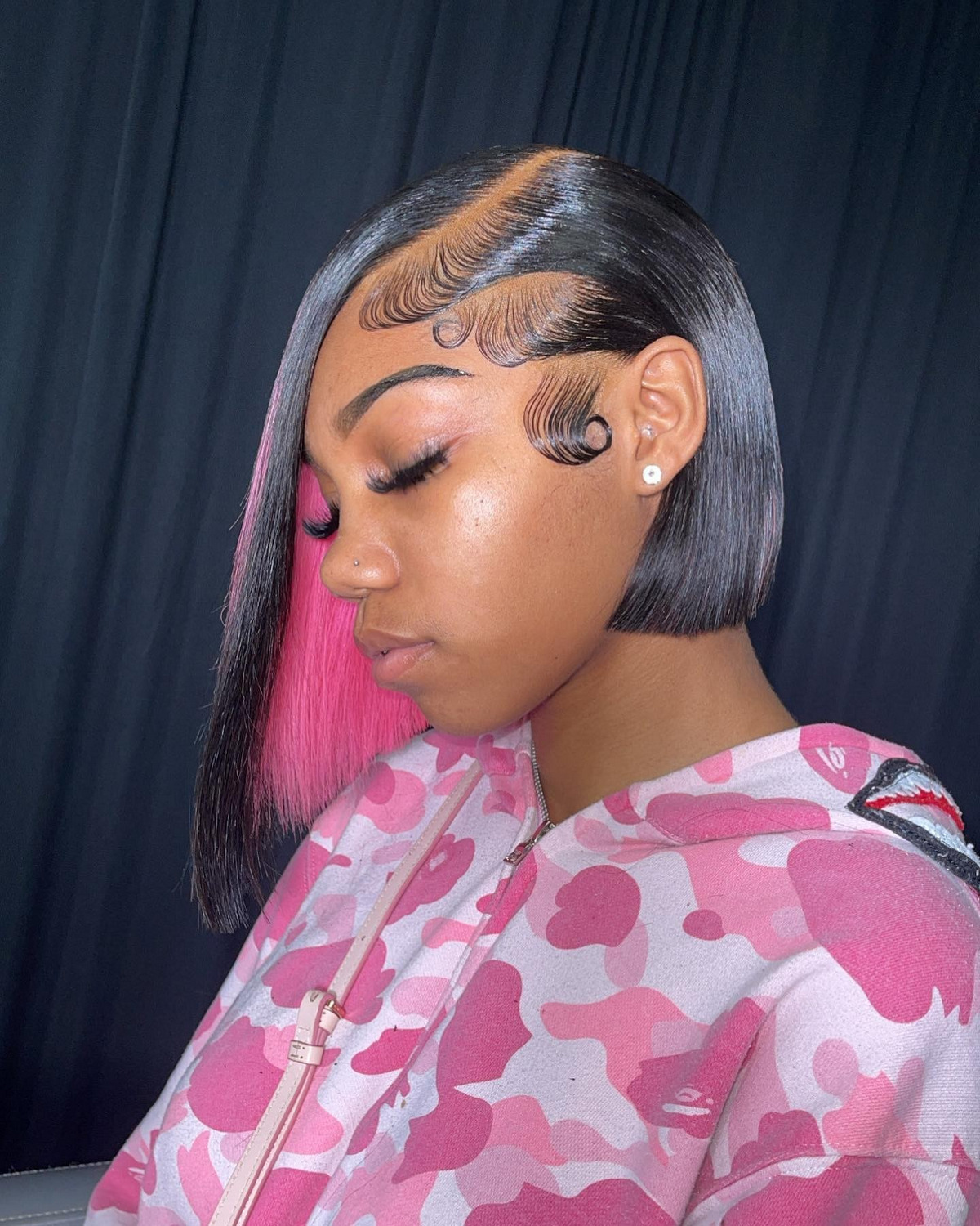 Asymmetrical Bob With A Peek-a-boo Pink