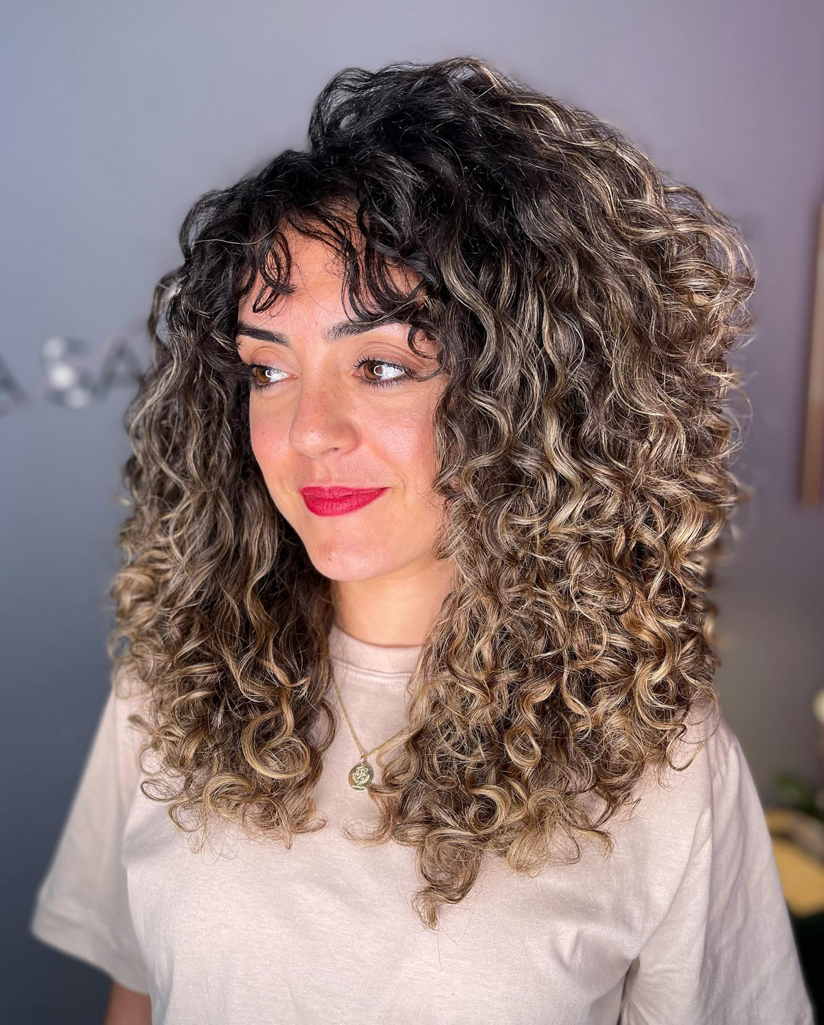 Medium-Length Curly Blonde Balayage