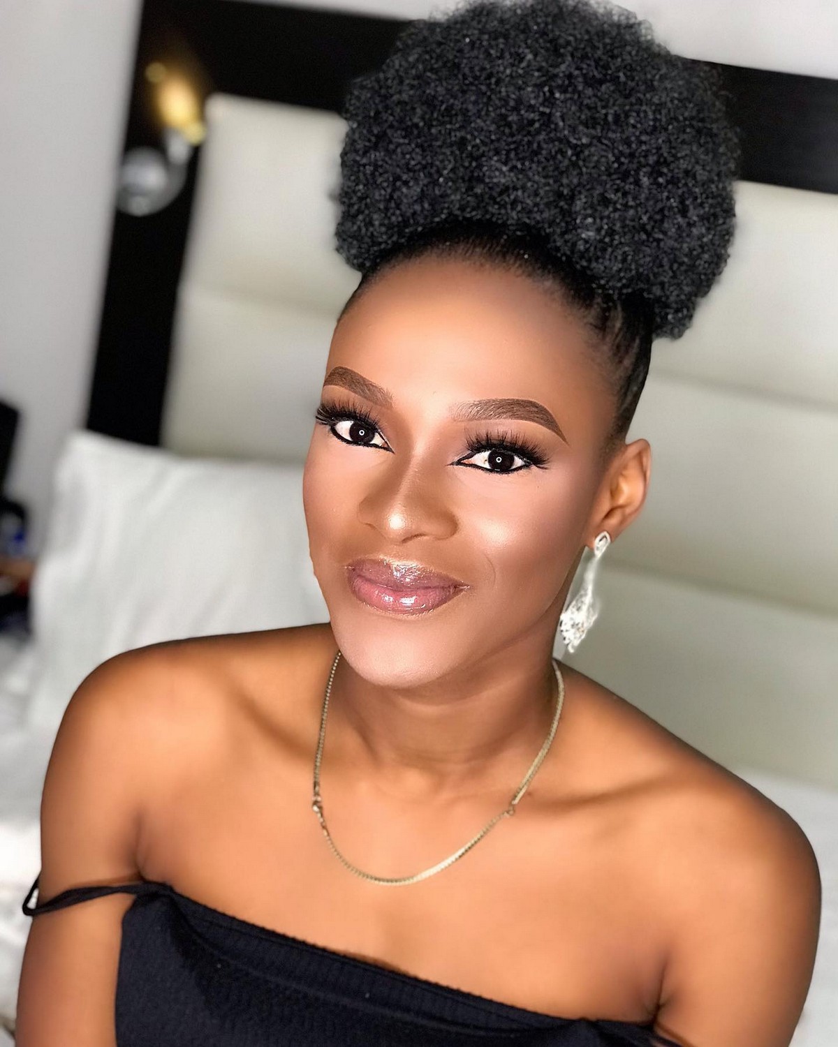 Neat Afro Puff Updo