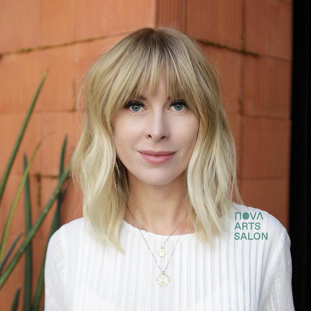 Blonde On Shoulder-Length Shaggy Bob With Choppy Bangs