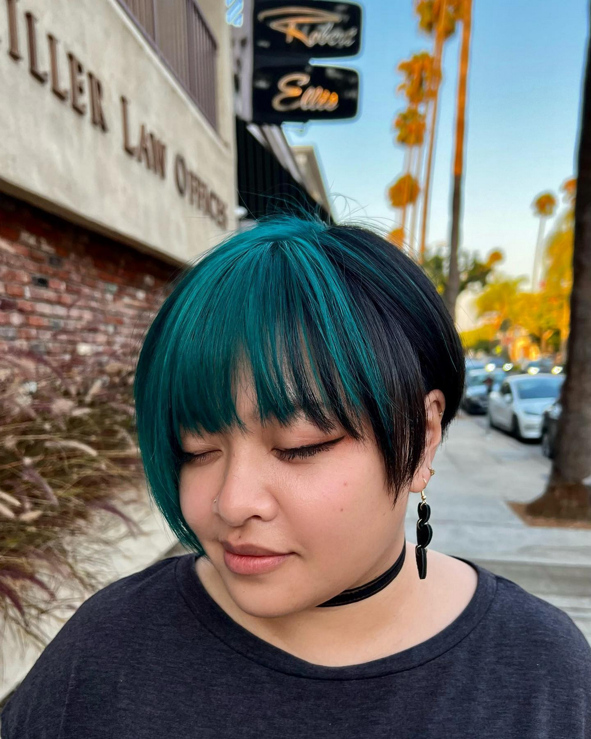 Teal Asymmetric Bob With Wispy Bangs