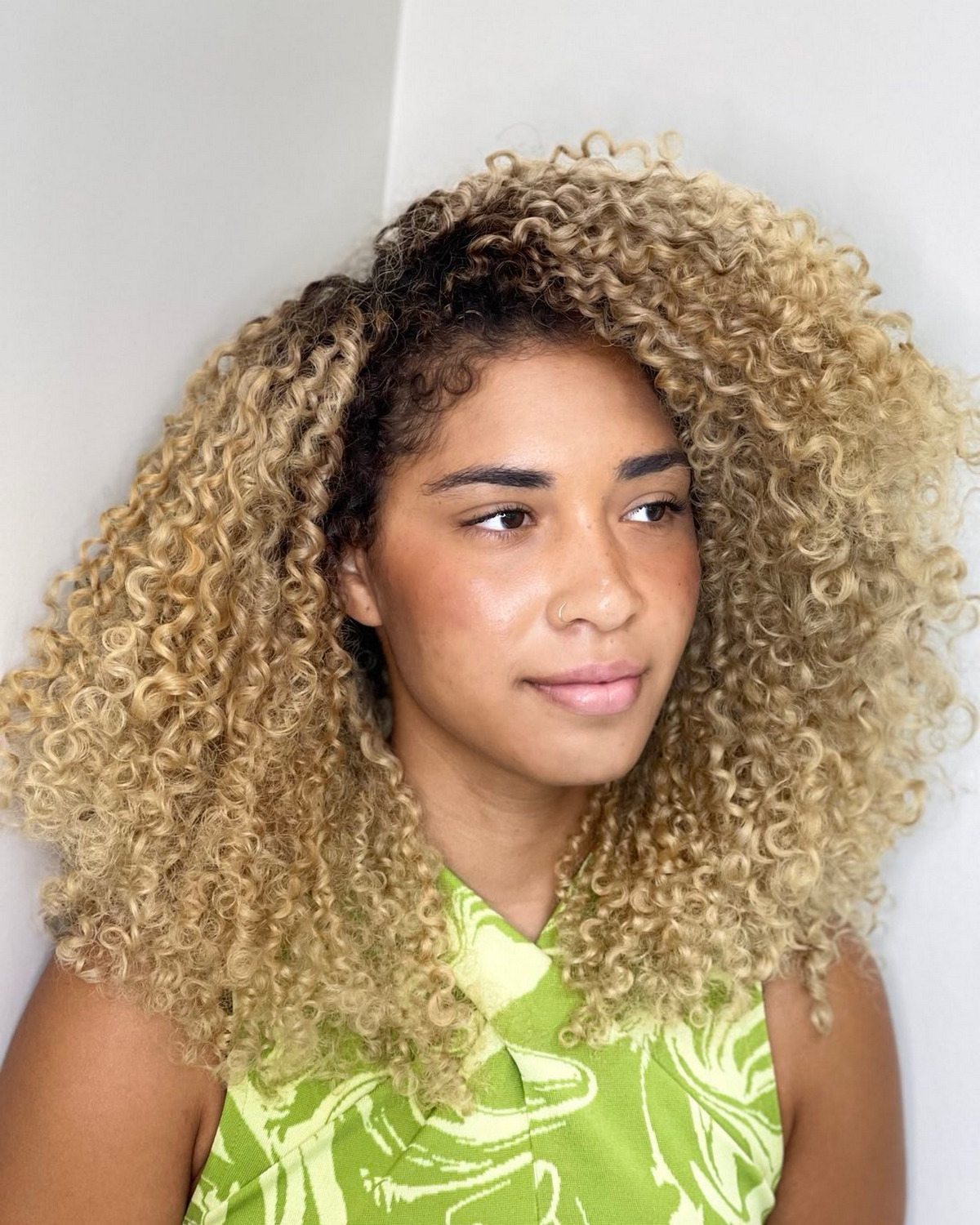 Side-Part Blonde Curly Hair