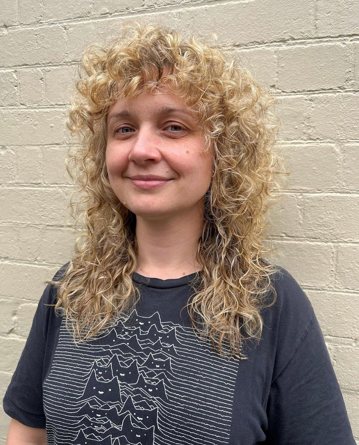 Curly Blonde Shag With Bangs