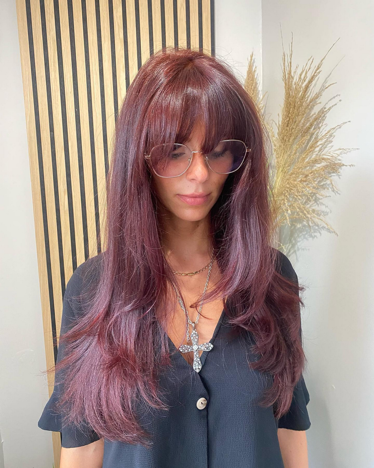 Long Layers Plum Hair With 70s Bangs