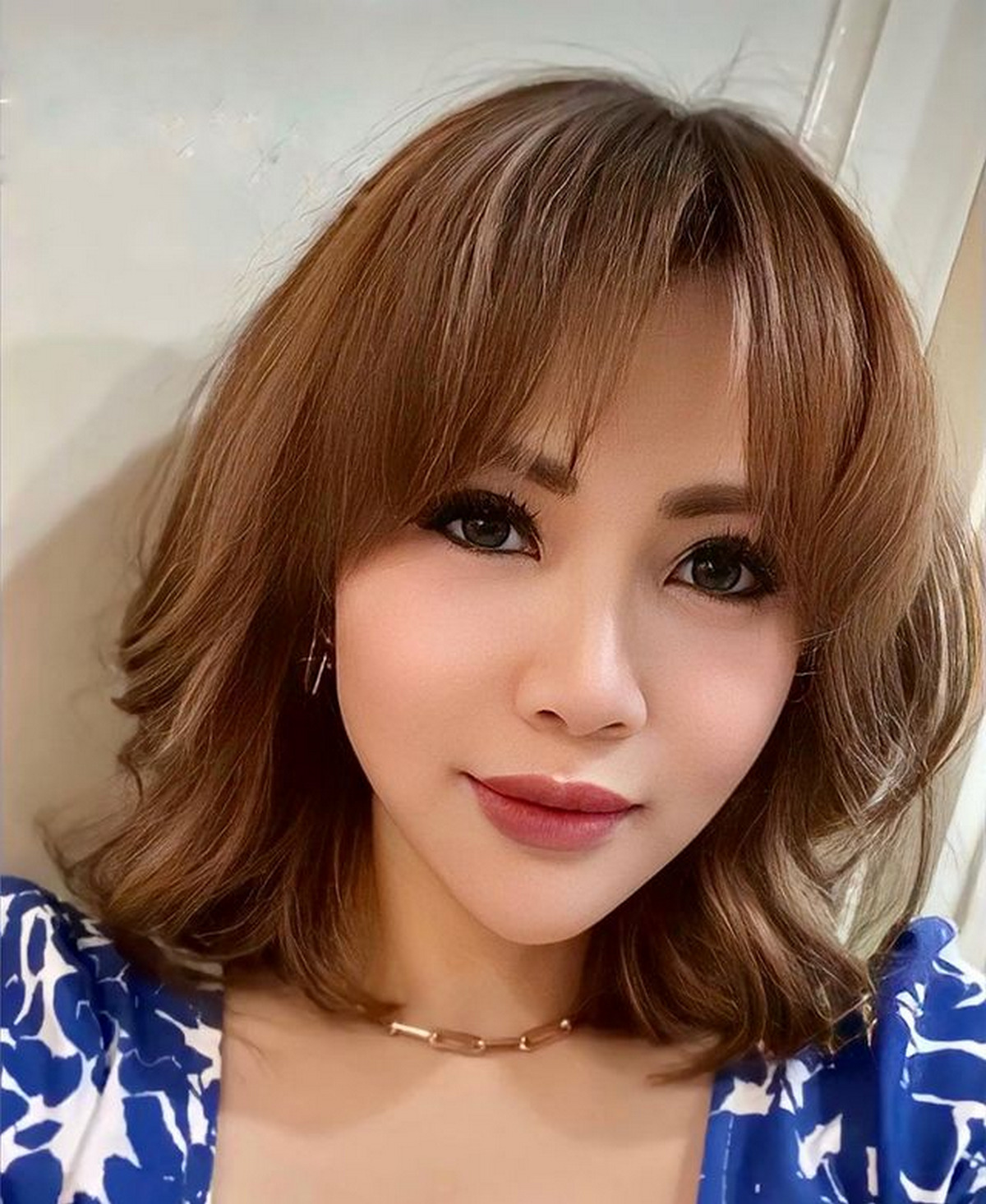 Medium-Length Hair With Curtain Bangs