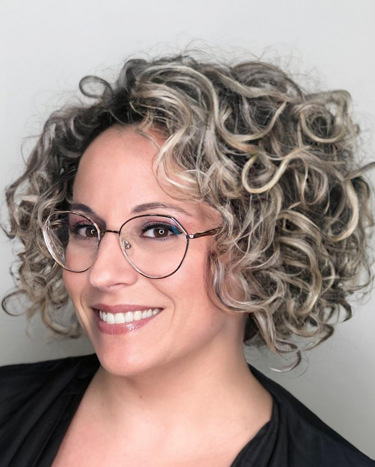 Curly Bob With Platinum Blonde Highlights