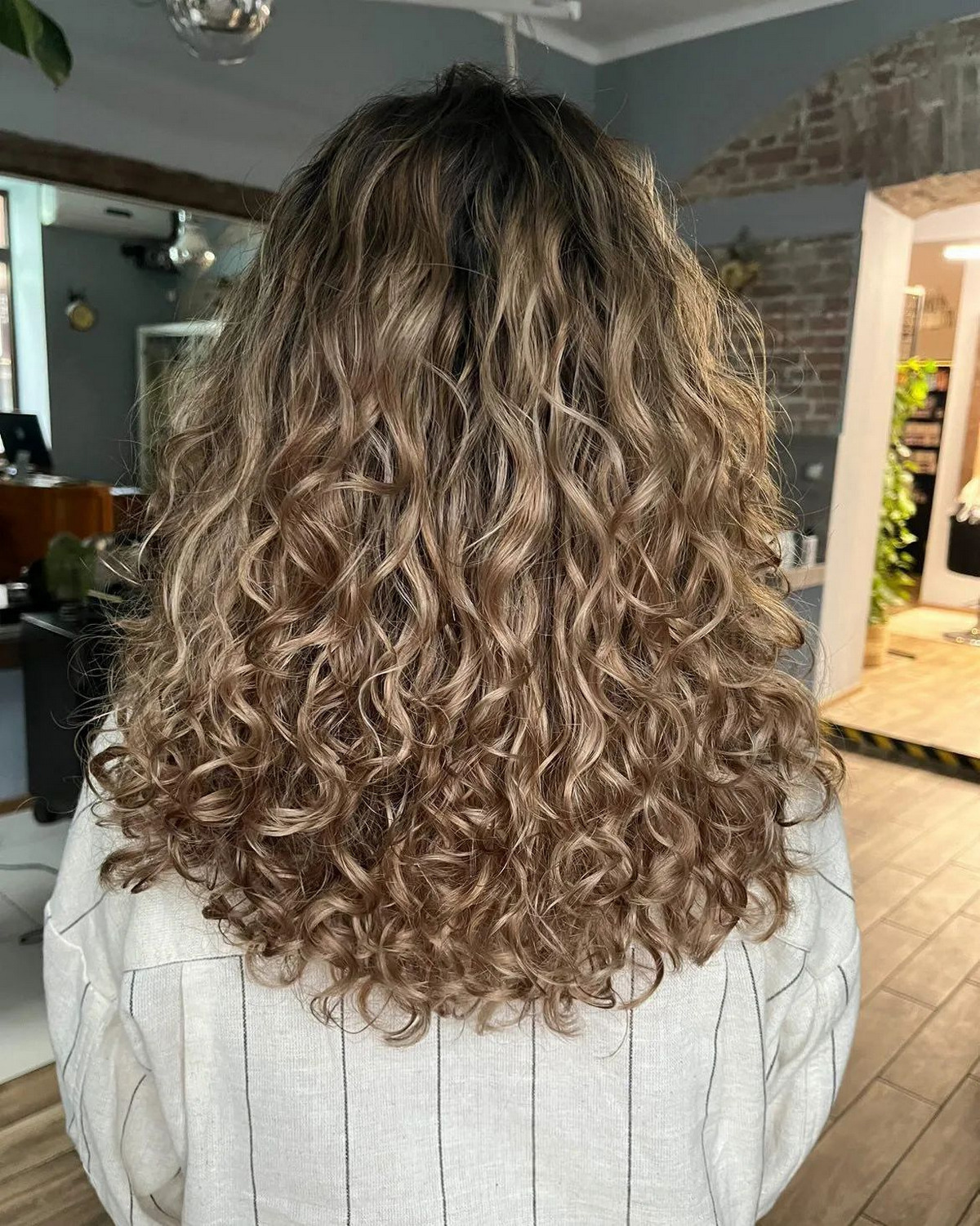 Curly Beige Blonde Balayage Hair