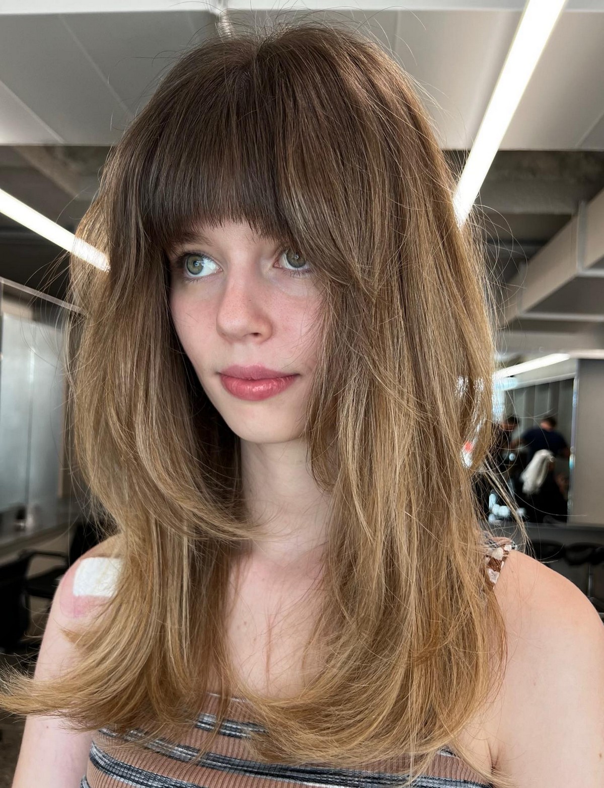 Chic Layered Hair with Textured Bangs