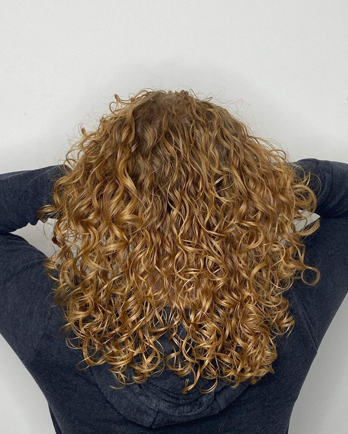 Warm Golden Blonde Curly Hair