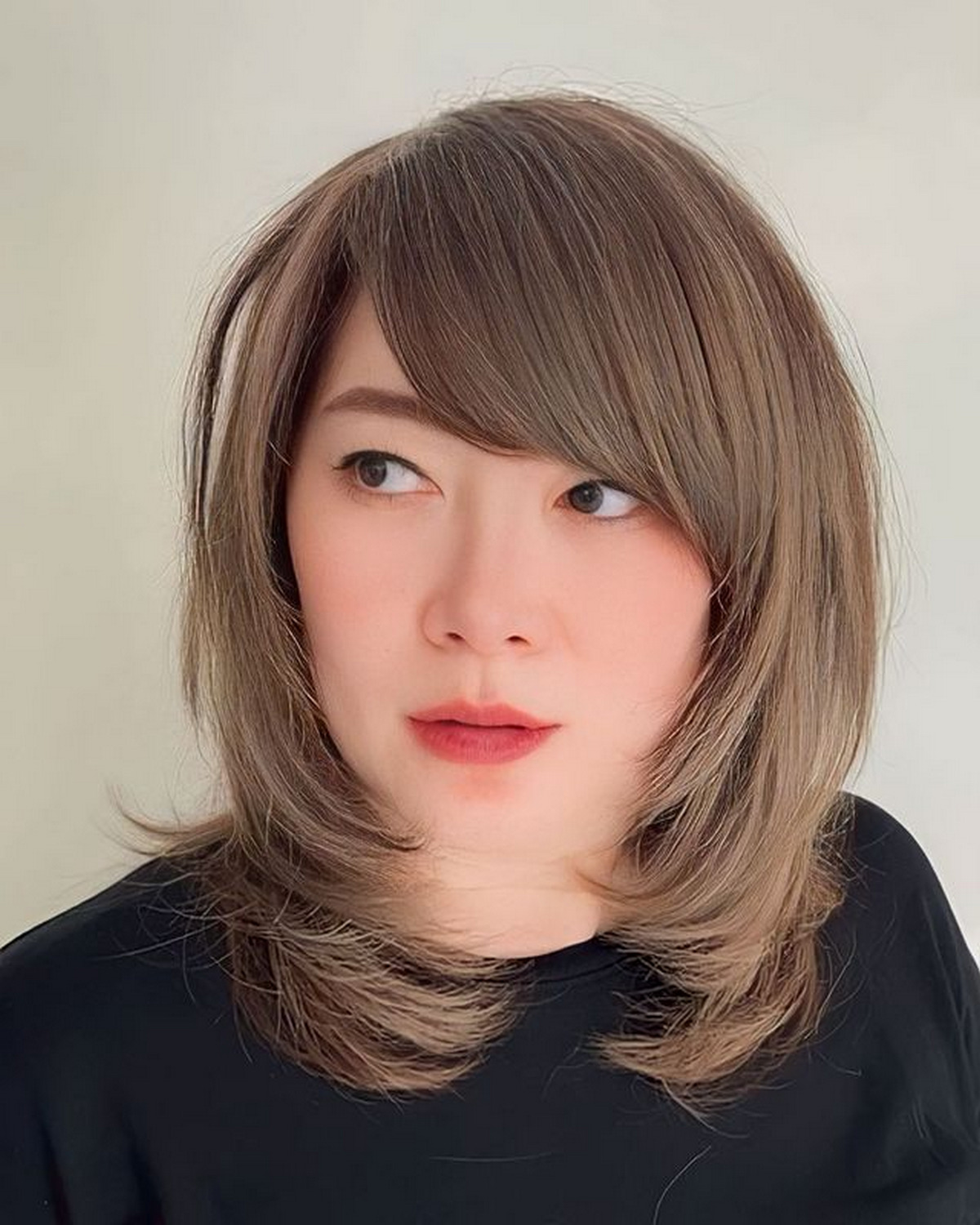 Layered Hair With Side-Swept Bangs