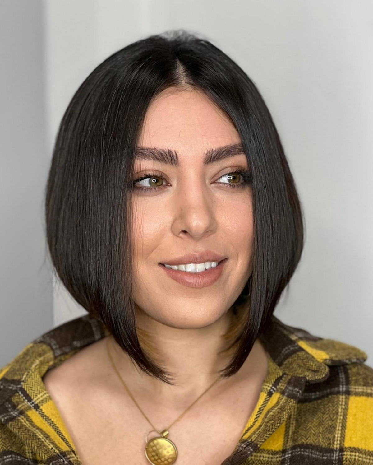 Sleek Middle-Parted A-line Bob