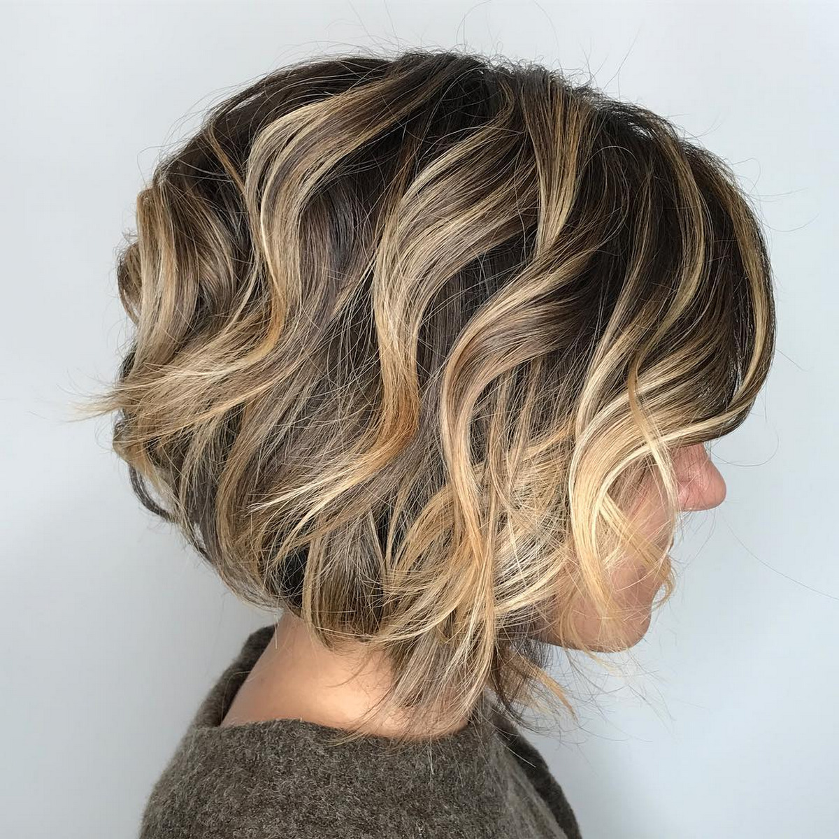 Curly Jaw-Length Bob With Choppy Layers