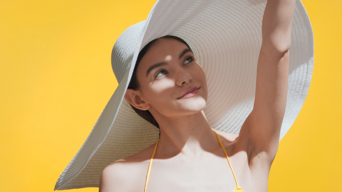 A wide-brimmed can protect your balayage hair from UV