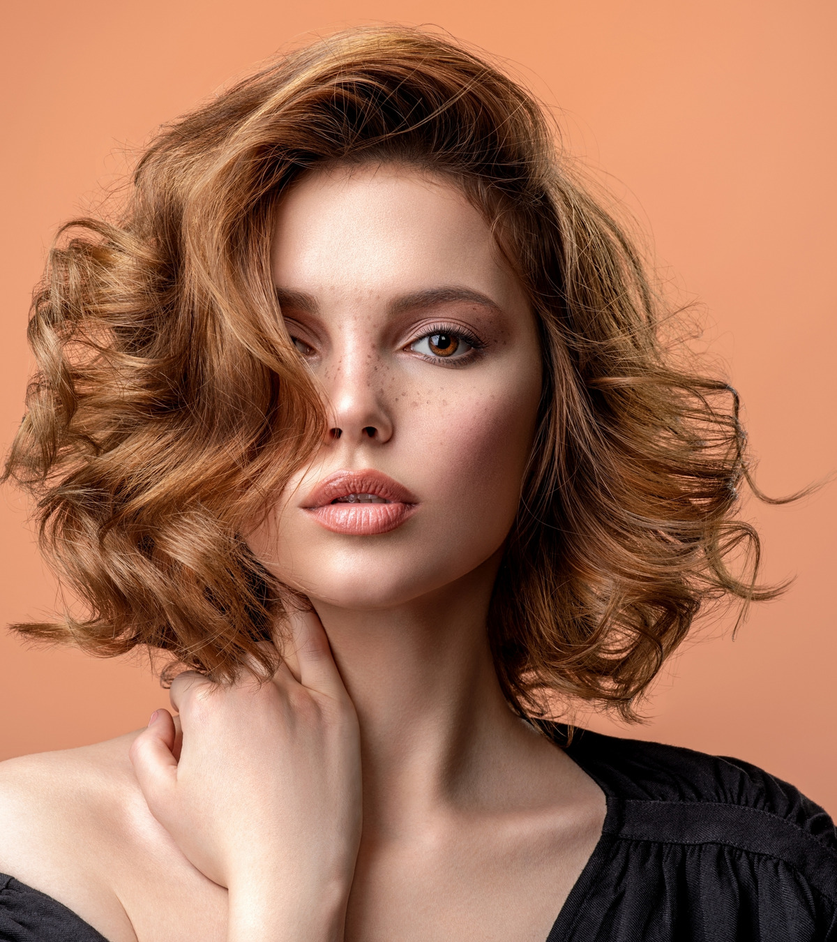 Beautiful brown-haired with a stylish short hairstyle