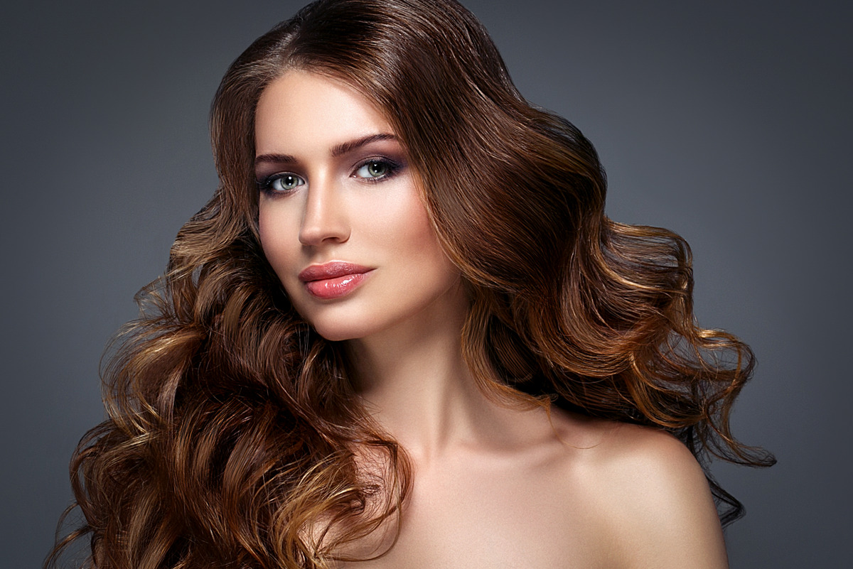 Beautiful face with balayage highlights hair