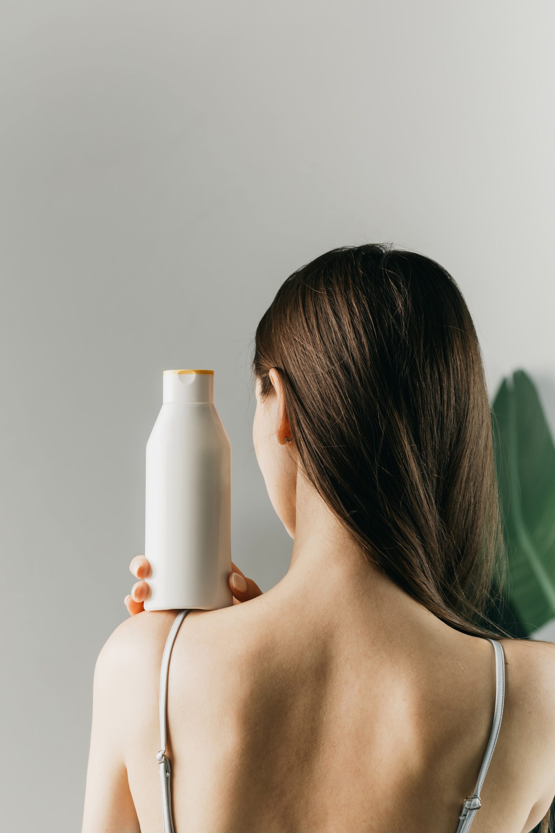 A girl with her shampoo choice