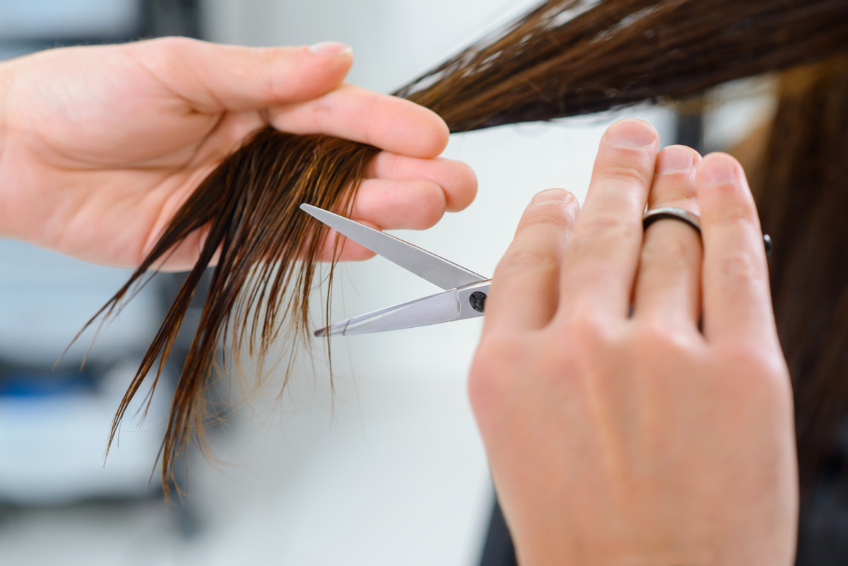 Close up of hair endings trimming procedure