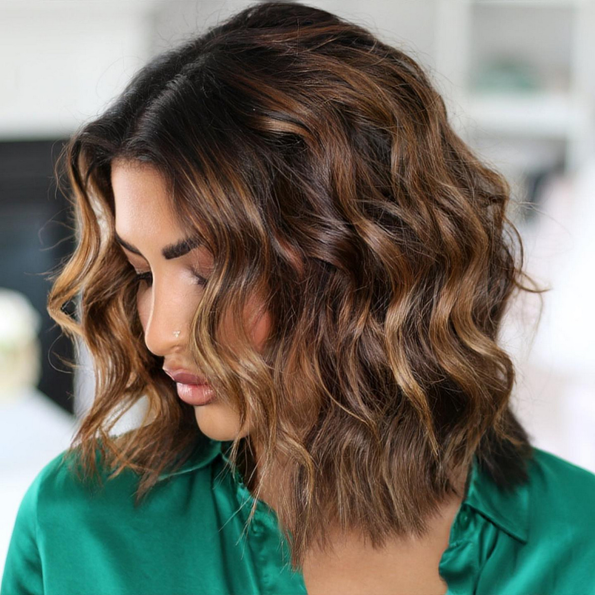 Girl has fine hair with a layer combination to create volume